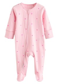 Body côtelé rose avec petits motifs de cœurs violets, doté d'une fermeture éclair à l'avant et de jambes avec pieds. Le matériau semble doux et extensible.