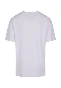Tricou alb din bumbac, cu decolteu rotund și mâneci scurte. Textură netedă; croială lejeră. Vedere din spate arată un design simplu, fără alte detalii.