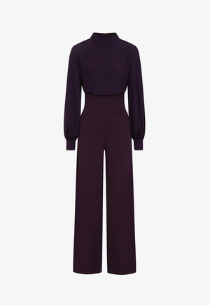 Lilla jumpsuit med høj hals, lange ballonærmer og bred ben-design. Lavet af et glat, tekstureret stof.