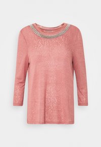 Hellrosa Langarm-T-Shirt mit einem Rundhalsausschnitt, der mit silbernen Pailletten verziert ist, aus strukturiertem Stoff und in einer lockeren Passform.