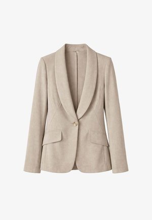 Blazer da donna beige su misura con collo a scialle, chiusura con un solo bottone e due tasche anteriori con patta.