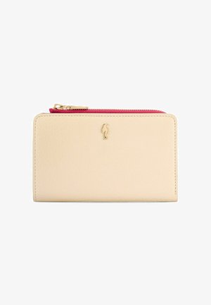 Beżowy skórzany portfel z czerwonym zamkiem błyskawicznym na górze i małym złotym emblematem ptaka na środku przodu.