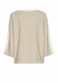 Pull en tricot beige avec de larges manches trois-quarts et des accents blancs le long des épaules. Texture lisse ; coupe carrée et courte.