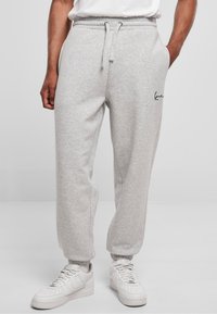 Karl Kani SMALL SIGNATURE UNISEX - Spodnie treningowe