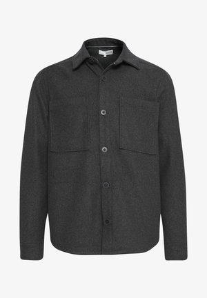 Sötétszürke flanel ing hosszú ujjal, hegyes gallérral, két mellzsebbel és hat gombbal az elején. Puha tapintású, finom színflekkekkel.