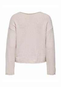 Pull en maille rose clair avec des manches longues, un col large et un tissu texturé. Il a une coupe cropped et des détails de couture visibles.