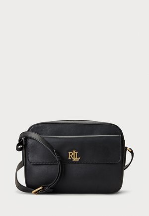 Black leather crossbody bag with a zip closure, rectangular shape, adjustable strap, and gold hardware featuring a logo accent on the front.