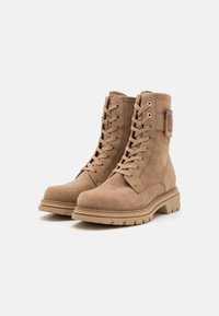 Tamaris Kotníkové boty na platformě - beige