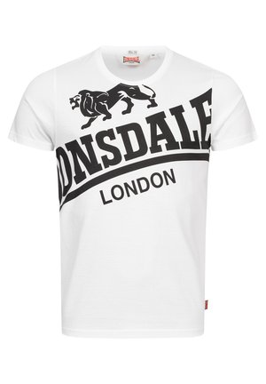 Witte T-shirt met korte mouwen met een zwart leeuwengrafiek en vetgedrukte tekst "DONDALE" boven "LONDEN" in een gebogen lettertype. Katoenen materiaal, ronde halsline.