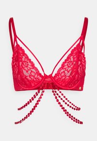 Crveni čipkani grudnjak s cvjetnim uzorcima, tankim naramenicama, košaricama s žicom i dekorativnim perlama koje vise sa sredine sprijeda.