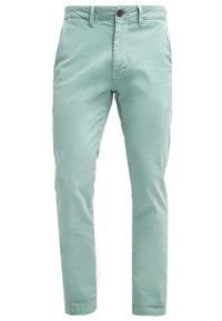 Světlé mátové kalhoty z hladké tkaniny, se zapínáním na knoflík, čtyřmi kapsami a tapered nohavicemi pro elegantní střih.