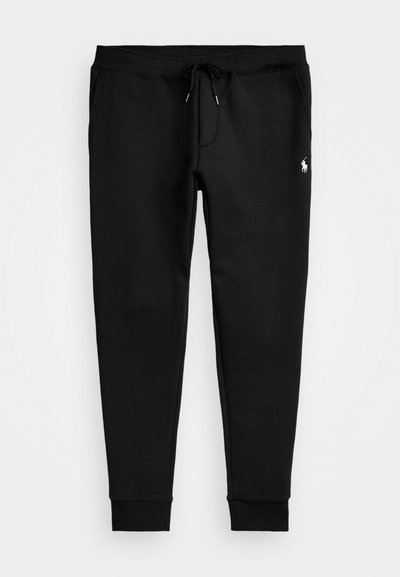 Black sweatpants made of soft fabric, featuring a drawstring waist, fitted cuffs, and a small white logo on the left leg.