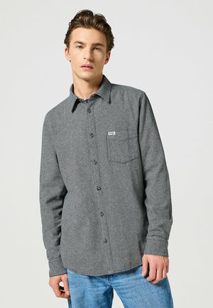 Gray checkered button-up shirt with a pocket, constructed from lightweight fabric, featuring a collar and long sleeves.