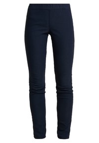 Tmavě modré slim-fit kalhoty s elastickým pasem, navržené pro těsný střih od pasu po kotníky.