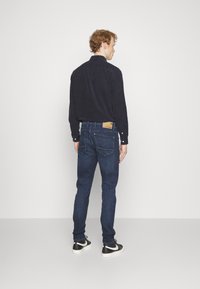 G-STAR REVEND SKINNY - Jeans Skinny Fit - worn in himalayan blue