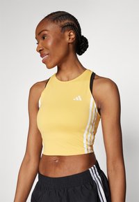 adidas Performance TANK - Topper - semi spark