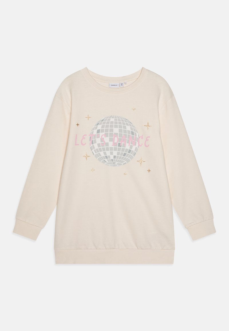 Krémová mikina s dlouhými rukávy, s velkým stříbrným grafickým motivem disco koule, růžovým textem "Pojďme tančit" a zlatými hvězdnými akcenty.
