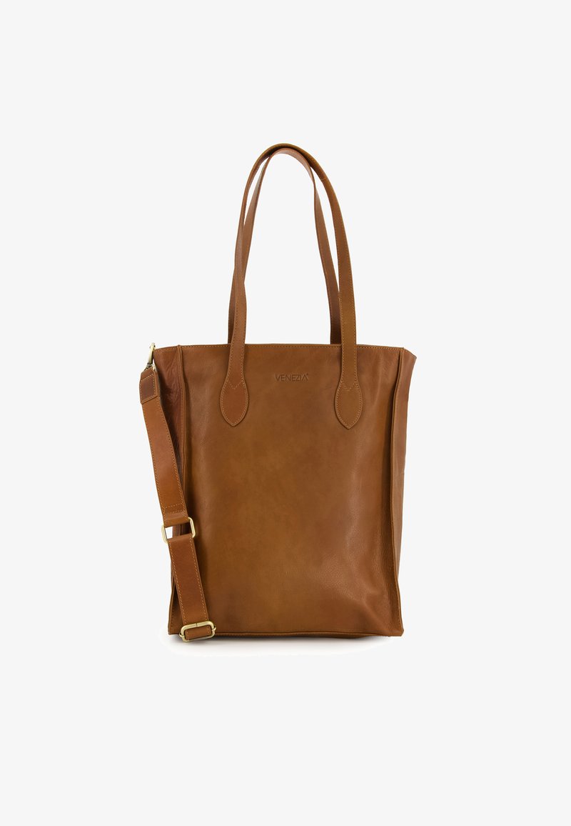 Brun læder tote bag med korte dobbelthåndtag og en aftagelig skulderrem. Glat tekstur, minimal hardware og prægede brandlogo.