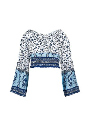 White cropped top with blue floral prints, gathered neckline, and bell sleeves. Design features paisley accents near the hem and sleeves.