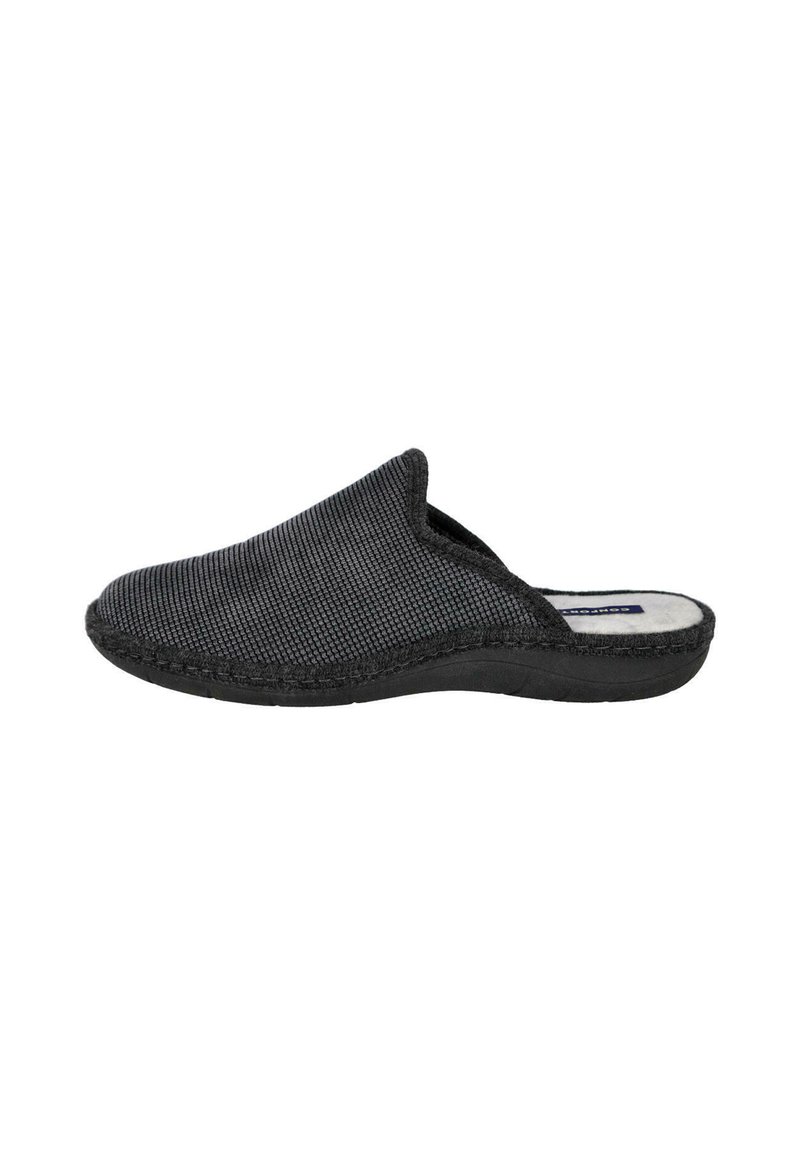 Zapato negro de tejido trenzado tipo slip-on con puntera redondeada y suela baja, con un upper texturizado y un suave forro interior.