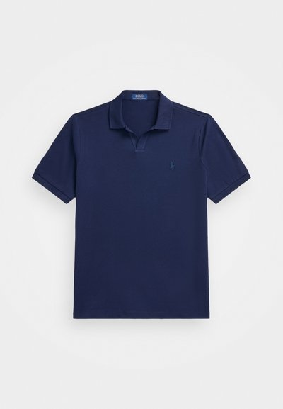 Navy blue polo shirt made of cotton, featuring short sleeves, a classic collar, and a small embroidered logo on the left chest.