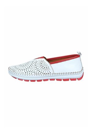 White slip-on shoe with perforated front, red trim, stitched sole, and red rubber outsole, shown in side profile.