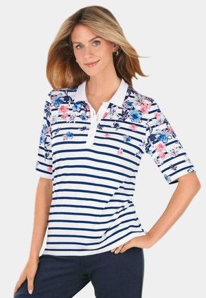 Korte mouw polo shirt in het wit met navy strepen. Bloemdesign in tinten blauw en roze op de kraag en mouwen. Knopen aan de voorkant.