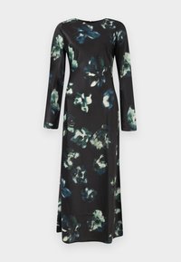Long-sleeve, floral-patterned dress in black fabric featuring green and white abstract flowers, with a round neckline and moderate drape.