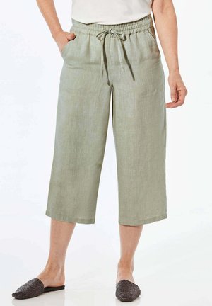 Lichtgroene linnen culottes met een elastische tailleband, trekkoord en zijzakken; soepele textuur, lengte tot halverwege de kuit, relaxte pasvorm.