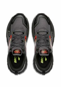 Black and grey athletic shoes with mesh upper, lace-up design, reflective accents, and bright green and red details on the heel and branding.
