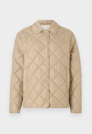 Beige quilted jacket with diamond pattern, rounded collar, snap button closure, and long sleeves. Smooth texture and lightweight appearance.