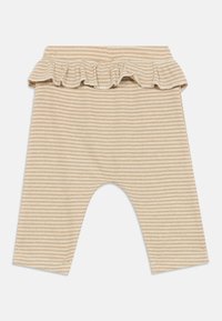 Μπέζ και λευκές ριγέ παντελόνες μωρού με ελαστική ζώνη και φρου φρου, φτιαγμένες από υφασμάτινο πλεκτό ύφασμα.