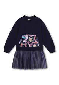 Marinblå långärmad klänning med paljett-stjärna och hexagonmönster på överdelen, i kombination med en plisserad tyllkjol.