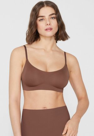 - Biustonosz push-up