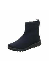 Botas de tobillo navy con parte superior de tela suave, cierre de cremallera y suela texturizada. El diseño incluye una punta redondeada y una lengüeta para facilitar el calzado.