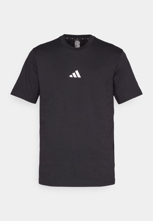 Black cotton t-shirt with short sleeves, featuring a white Adidas logo on the chest. Classic crew neck design.