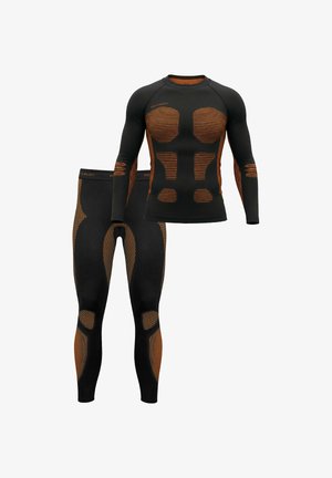 Compression base layer set in black and orange. Long-sleeve top features striped pattern; leggings with textured accents and mesh details.