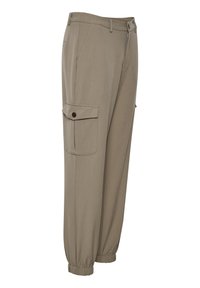 Cargo-byxor i beige tyg, med elastisk midja, smalnande mudd, en sidoficka med knapp och en slät yta.