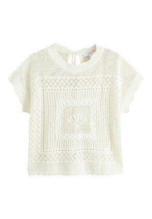 Krēmkrāsas īsroku trikotāžas topiņš ar ģeometriskiem un pinuma rakstiem, apaļu kakla izgriezumu un aizmugurē kroku atslēgas dobuma aizdari ar lentīti.