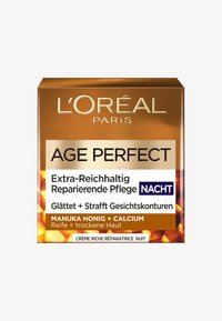 L'Oréal Paris Age Perfect nattkräm i guld och orange färgschema, med text som framhäver fördelar, med honung och kalcium som nyckelingredienser.