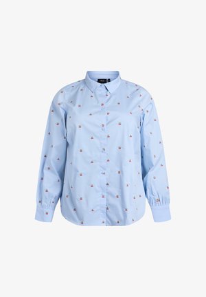 Vaaleansininen nappipaita puuvillasta, jossa pieniä kirsikkakuvioita. Pitkät hihat nappilistoin, perinteinen kaulus ja normaalisti istuva malli.