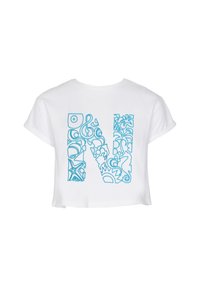 White cropped t-shirt featuring a large blue decorative letter "N" filled with various abstract patterns and shapes. Short sleeves.