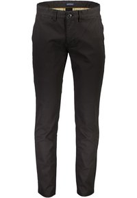Chinos en coton noir avec une coupe slim, dotés d'une fermeture à boutons sur le devant, de passants pour ceinture, de poches latérales et d'une texture lisse.