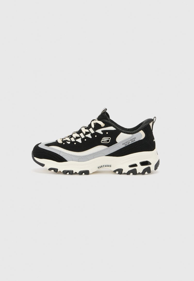 Black and gray athletic shoes with a cushioned sole, fabric upper, and laces. Features a logo and accent details on the side.