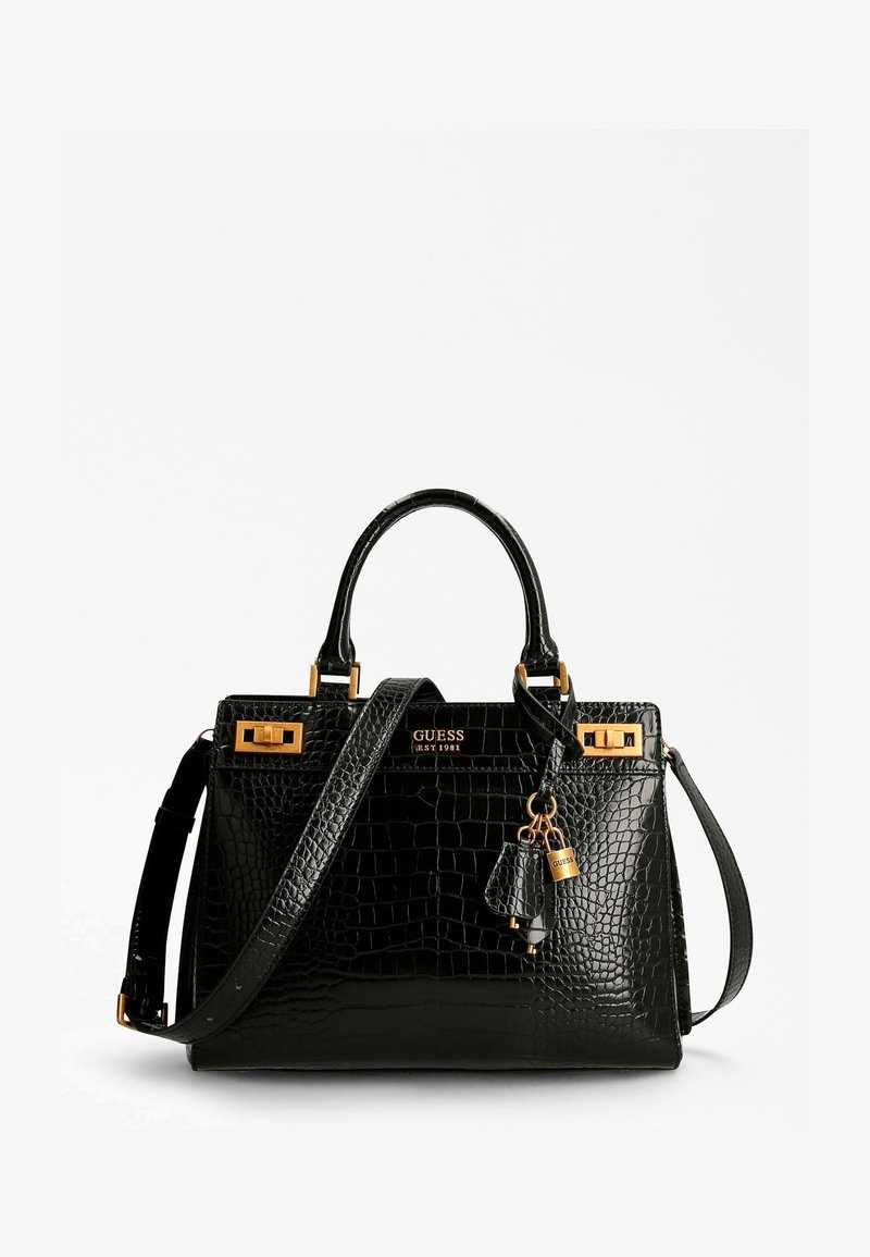 Sac à main noir en cuir embossé effet crocodile avec quincaillerie dorée, double poignée supérieure, bandoulière amovible et accents porte-clés.