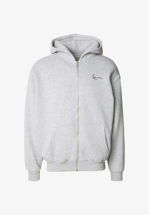 šedá mikina na zip vyrobená z měkké bavlněné směsi, s prostornou kapucí, předními kapsami, žebrovanými manžetami a malým logem na levé straně.