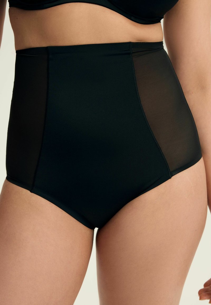 Czarne bikini z wysokim stanem, z przezroczystymi bocznymi panelami i gładką fakturą. Zaprojektowane z myślą o smukłym dopasowaniu i komforcie.