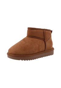 Braune Wildleder-Stiefeletten mit runder Spitze, umgeschlagenem Schaft und einer strukturierten Gummisohle mit Zickzackmustern.