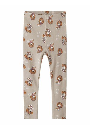 Beżowe prążkowane legginsy z powtarzającym się wzorem zabawnych psów i kwiatowych akcentów. Komfortowy materiał z elastycznym pasem.