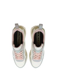 White and light gray sneakers with pink laces, mesh accents, and gold detailing. Features a textured sole and pull tab.